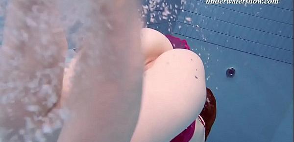  Underwater swimming teenie Lenka gets naked